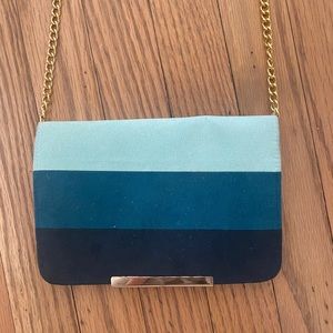 Wristlet with gold chain